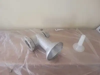 Meat grinder attachment with a sausage stuffer tube, View more