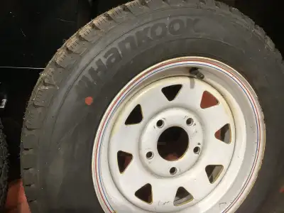 These are brand new car tires on 13” trailer rims see photos