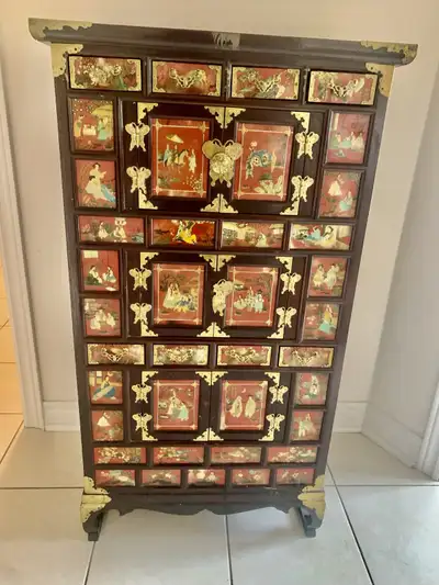 This set of Chinese Hong Kong furniture includes a unique black laquer bar cabinet, a coffee table,...