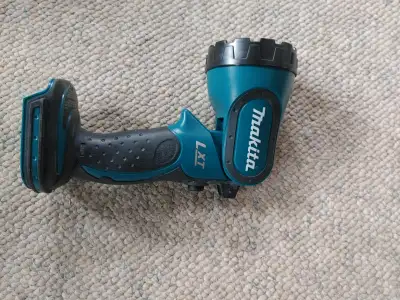 Makita DML185 light. New, never used. 18 volt lithium ion. New price is over $70 from Amazon, see la...