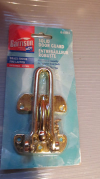 BN Garrison solid door quard brass finish.