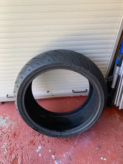 Motorcycle Tire. 240/40/R18 tire. Used. Driven less than 30 km on it. Good as new. Contact me. I’m l...