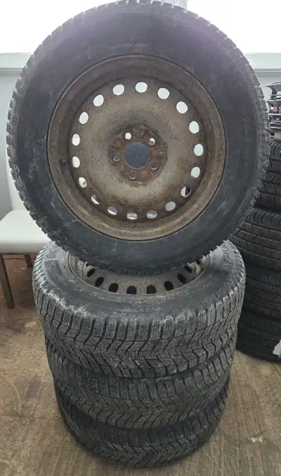 Set of four - 225/65/17 Continental Winter Contact tires mounted on steel rims (steel rims from a 20...