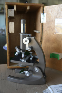 Swift compound microscope in original wooden carrying case