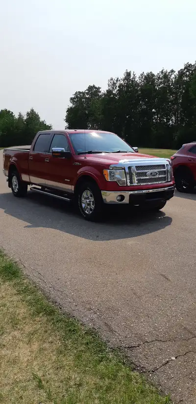 2012 Ford 150 Lariat, 6.5 ft. box, power seats, locks, windows, cruise, tilt, bluetooth, trailer bra...