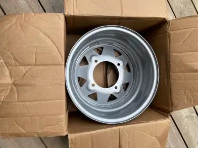 Brand new Steel Rim. Pic of sticker has size.