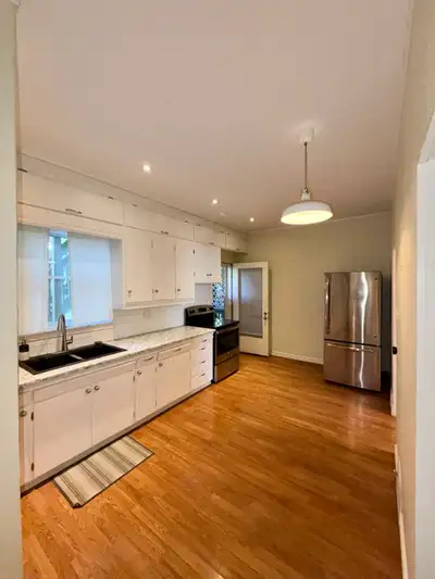 Large 1 bedroom + den occupying main floor and basement of a charming St. Clair neighbourhood duplex...