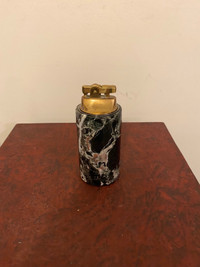 Vintage marble petrol lighter.4.5”tall.