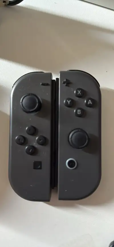 Nintendo switch, an extra pair of controllers and a game, View more