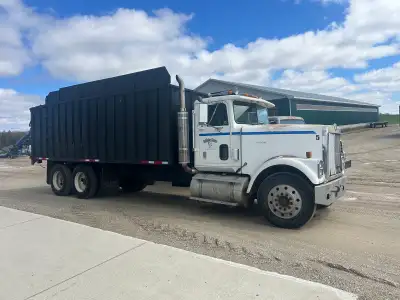 1994 Eagle tandem truck with L10 Cummins. 22’ box with 6’ sides. 10 speed transmission