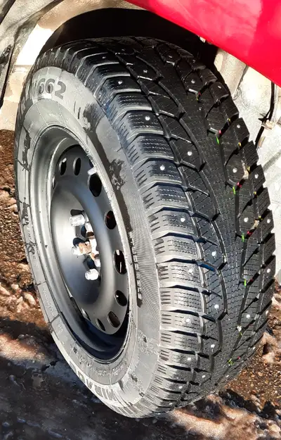 Car tires. Four winter studded tires with black rims. Used for a couple of months last year. Excelle...