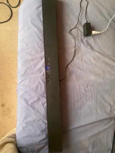 It is a 37" RCA Home Theater SoundBar, included a powe supply adapter. It works well no issue and is...