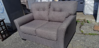 Grey Loveseat in New Condition