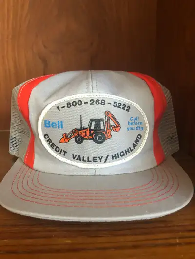 Hi, -new old stock (not used) -vintage Bell Canada SnapBack baseball cap “call before you dig” -see...