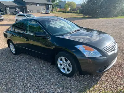 2007 Nissan Altima 226,000 km Winter and all season tires both on factory alloy rims, remote start,...