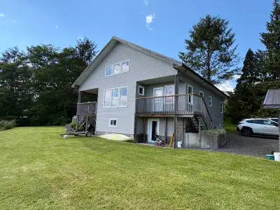 WATERFRONT LIVING WITH INCOME POTENTIAL IN THE HEART OF HAIDA GWAII Discover a rare waterfront prope...