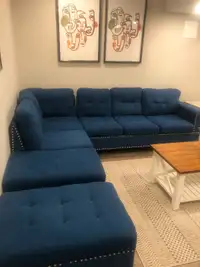 Sectional with stud accents and ottoman