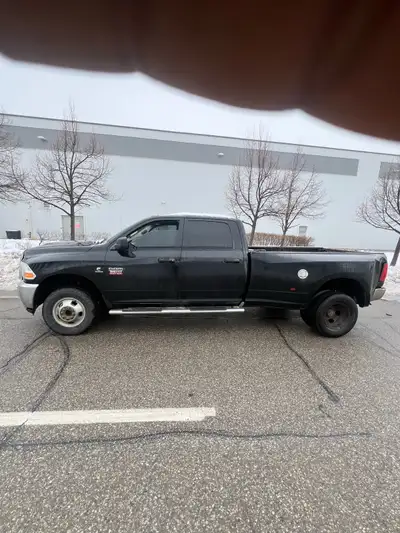 This Dodge Ram 3500 is equipped with a robust 6.7 Cummins engine. The truck has seen some action and...
