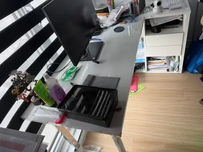 This is a modern glass office desk from Structube, perfect for a home office or study space. This de...