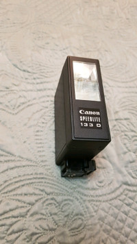 Canon Speedlite 133D flash.