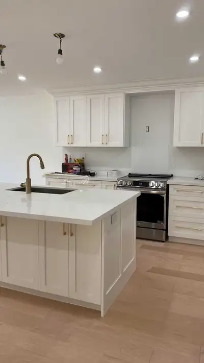 kitchen cabinets and island, View more