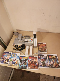 Nintendo Wii with 4 Controllers and 7 Games and Manual