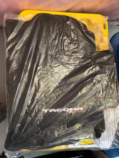 Brand new Toyota Tacoma carpet mats still in packaging