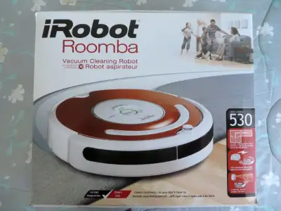 Aspirateur iRobot Roomba Modèle 530 Très peu utilisé Vient avec sa base de chargement et deux murs v...
