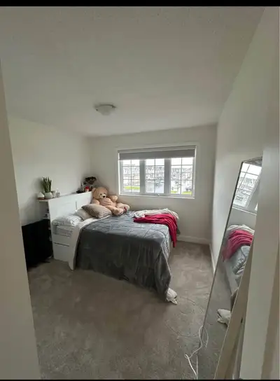 A bright and spacious unfurnish bedroom is available for sharing with one girl in a clean, well-main...