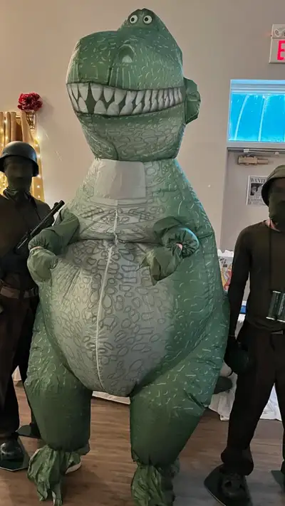 Rex Save the tax. Used once, indoor party. Full adult size Inflatable , battery operated .