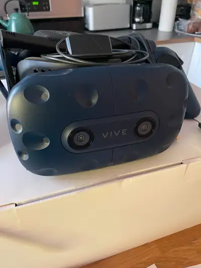 HTC VIVE Pro 2. With wireless adapter and 3rd Base station 2.0., View more