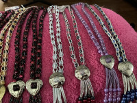 Beads ,necklaces already made , nice , project for crafters