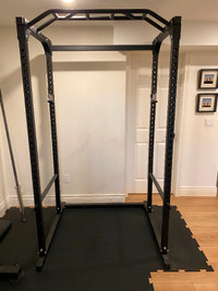 Power rack + flat bench with olympic plate weights  and barbell
