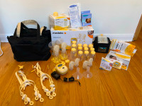 Medela Freestyle Pump and with tons of accessories