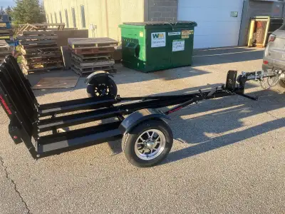 stinger trike motorcycle trailer folds up and pushable on built in casters about size of gas bbq . a...