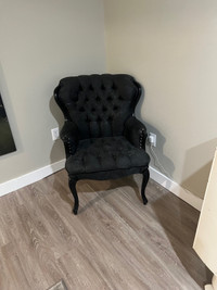 Black upholstered chair 