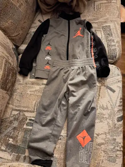Pic. 1 Grey outfit Jordan Size 4T $30 Pic. 2 Black outfit Jordan top 12 months,pants 24 months $30 P...