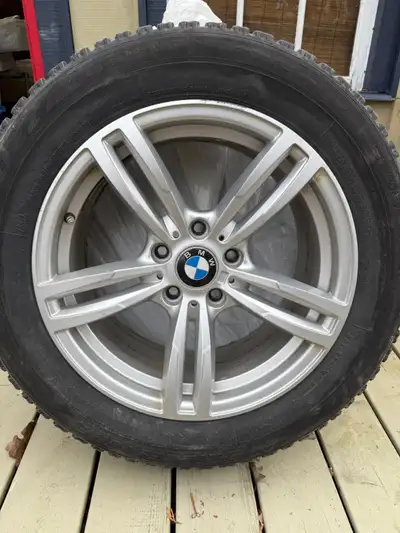 Set of 4 BMW OEM alloy rims with mounted Bridgestone Blizzak LM-50 winter tires. Tire size: 225/60R1...