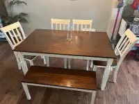 Table, 4 chairs and a bench  