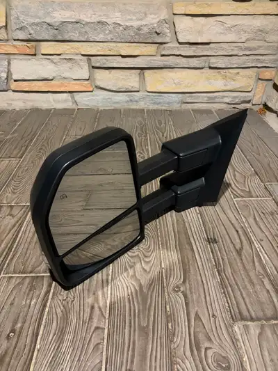 Ford SuperDuty Mirror (driver's side only). Fits 2017+. Is extendable, has side LED blinker and heat...