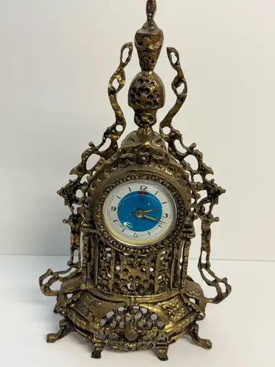 Brass Ornate vintage clock with intricate design , View more