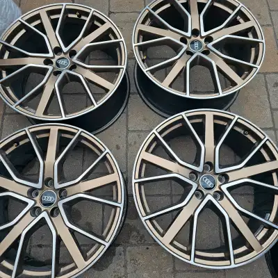 selling four 20 inch Audi OEM alloy rims for $1800. Part # 8S0601025CH there is selling $1300 each a...