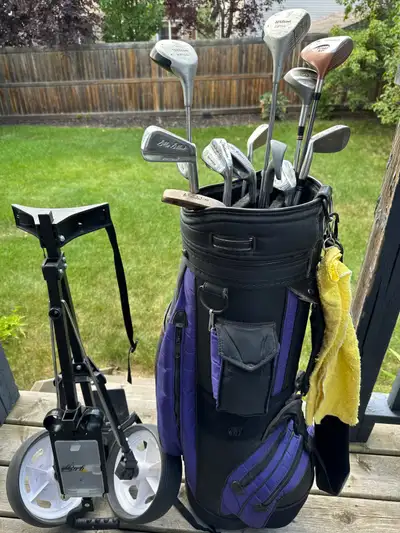 golf clubs and cart , View more