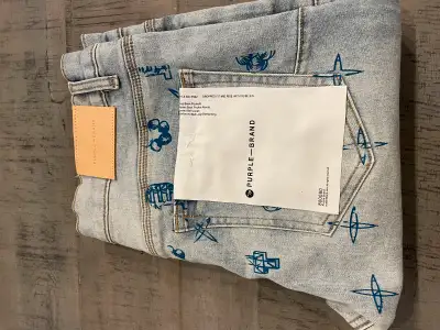 Purple jeans size 34 Brand new