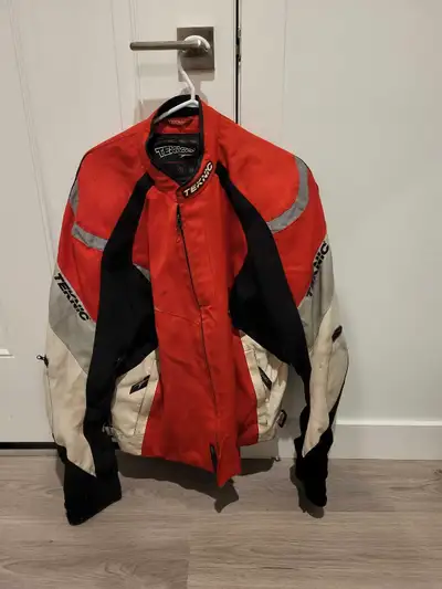 Teknic jacket with pads. Size 48. Great jacket no tears. Spine pad shoulders and arms.