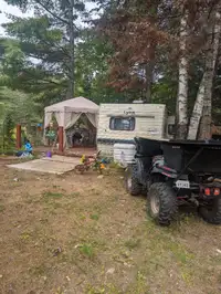 RV trailer on permanent lot in Gatineau hills