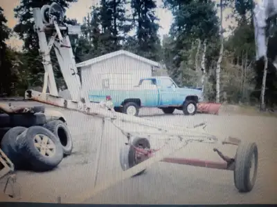 Trailer had a 18 foot fiberglass boat on it remove some rollers ad a couple sheets of plywood and us...