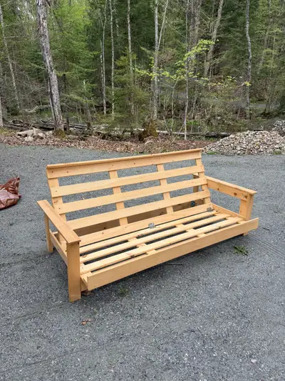 IKEA Double futon frame. Here until 6:00pm Thursday, May 15th or it becomes great fire wood.