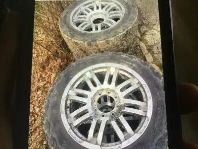 Four tires with rims. Tire size LT275/55R20. 115/112S. Load range D
