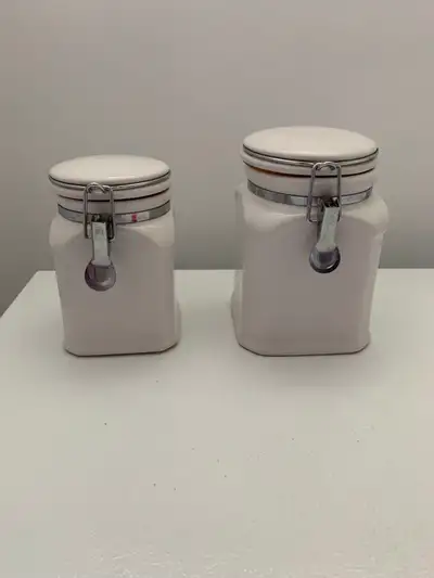 2 white airtight ceramic kitchen canisters, View more